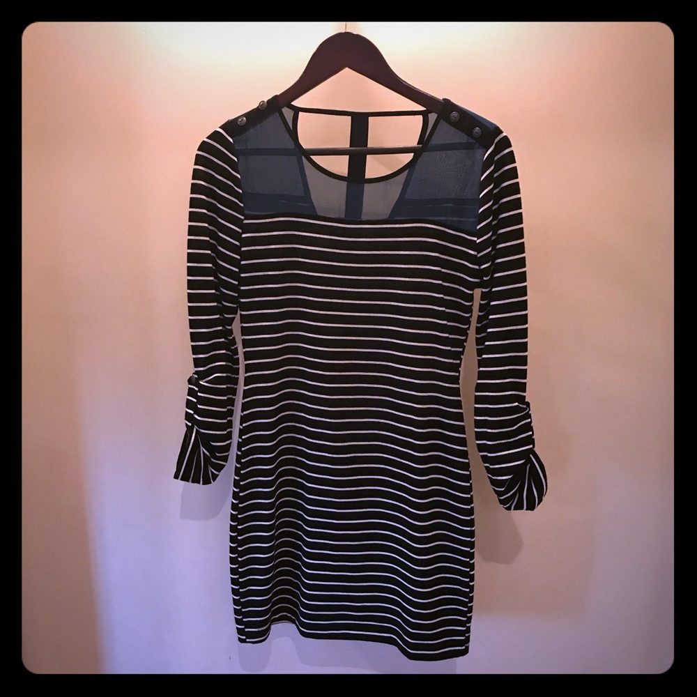 Long Tunic-style sweater with mesh panels